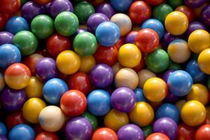 Multi-colored plastic balls background. A children's playroom. photo