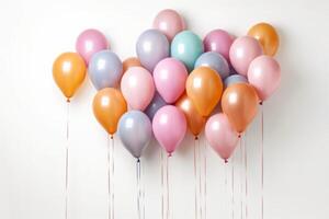 Many pastel balloons decorated white wall. photo