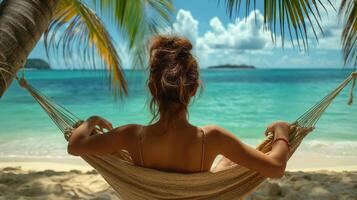 Beautiful beach. Hammock between two palm trees on the beach. Holiday and vacation concept photo