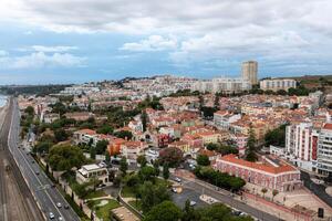 Traffic driving over highway in Lisbon aerial view photo