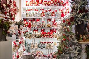 Christmas souvenirs on shelves for sale in store photo