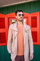 Fashionable man in sunglasses autumn photo