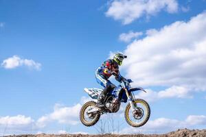 Kharkov. Ukraine March 2021 Moto cross training Enduro bike ride off road track photo