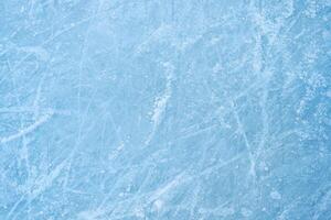 Ice rink background with visible traces of skating photo