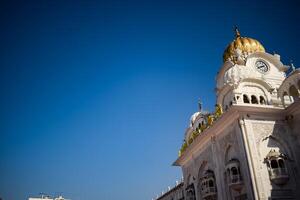 View of details of architecture inside Golden Temple - Harmandir Sahib in Amritsar, Punjab, India, Famous indian sikh landmark, Golden Temple, the main sanctuary of Sikhs in Amritsar, India photo