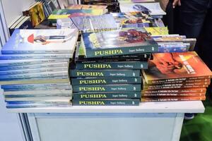 New Delhi, India, February 17 2024 - Variety of Books on shelf inside a book-stall at Delhi International Book Fair, Selection of books on display in Annual Book Fair at Bharat Mandapam complex photo