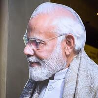 New Delhi, India - February 17 2024 - Prime Minister Narendra Modi cut out during BJP road show, the poster of PM Modi while attending a big election rally in the capital photo