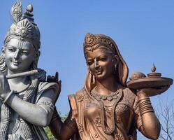 Big statue of Lord Radha Krishna near Delhi International airport, Delhi, India, Lord Krishna and Radha big statue touching sky at main highway Mahipalpur, Delhi photo