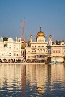 View of details of architecture inside Golden Temple - Harmandir Sahib in Amritsar, Punjab, India, Famous indian sikh landmark, Golden Temple, the main sanctuary of Sikhs in Amritsar, India photo