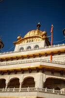 View of details of architecture inside Golden Temple - Harmandir Sahib in Amritsar, Punjab, India, Famous indian sikh landmark, Golden Temple, the main sanctuary of Sikhs in Amritsar, India photo