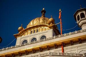 View of details of architecture inside Golden Temple - Harmandir Sahib in Amritsar, Punjab, India, Famous indian sikh landmark, Golden Temple, the main sanctuary of Sikhs in Amritsar, India photo