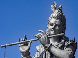 Big statue of Lord Radha Krishna near Delhi International airport, Delhi, India, Lord Krishna and Radha big statue touching sky at main highway Mahipalpur, Delhi photo