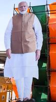 New Delhi, India - February 17 2024 - Prime Minister Narendra Modi cut out during BJP road show, the poster of PM Modi while attending a big election rally in the capital photo