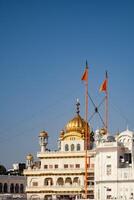 View of details of architecture inside Golden Temple - Harmandir Sahib in Amritsar, Punjab, India, Famous indian sikh landmark, Golden Temple, the main sanctuary of Sikhs in Amritsar, India photo