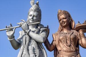 Big statue of Lord Radha Krishna near Delhi International airport, Delhi, India, Lord Krishna and Radha big statue touching sky at main highway Mahipalpur, Delhi photo