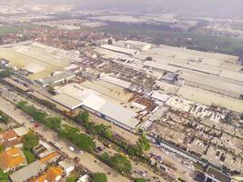 The impact of the natural disaster of a typhoon that hit the Rancakek area and the Sumedang border on February 21 2024, Indonesia. Shot from a drone flying 200 meters high photo