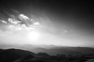 Monochrome sunset view over the hills. Mount Nemrut sunset scenery photo