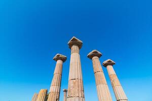 Columns of the temple of Athena in Assos ancient city photo