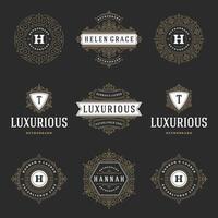 Vintage logos templates set, flourishes calligraphic elegant ornaments frames and borders. vector