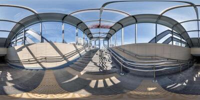 hdri 360 panorama view on pedestrian footpath and stairs inside tunnel or subway in full spherical equirectangular projection. VR AR content photo