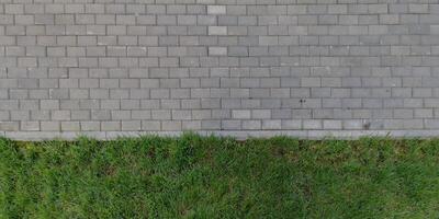 top view of the texture of paving slabs on pedestrian path photo