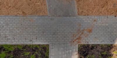 top view of the texture of paving slabs on pedestrian path photo