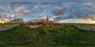 360 hdri evening panorama on old graveyard cemetery with gravestones and monuments at sunset in full equirectangular seamless spherical projection with zenith, VR content photo