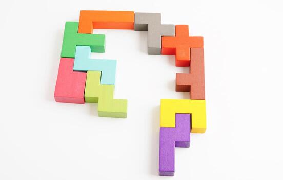 Logical thinking and problem solving problem solution creative business concept, wooden puzzle geometric block shape. photo