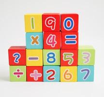 Number wood block cubes for learning Mathematic, education math concept. photo