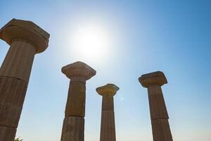 Columns of the temple of Athena in Assos Ancient City. photo