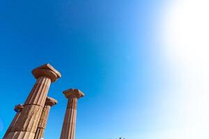 Columns of Temple of Athena in Assos ancient city with copy space for text photo