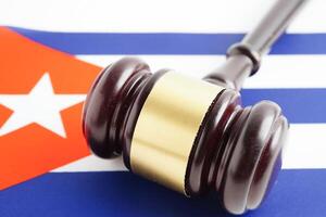 Cuba law, Legal, justice and agreement, wooden court gavel on flag. photo