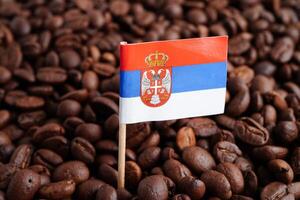 Serbia flag on coffee beans, shopping online for export or import food product. photo