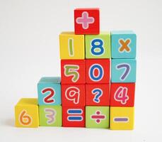 Number wood block cubes for learning Mathematic, education math concept. photo