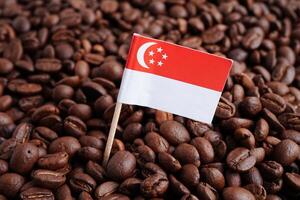 Singapore flag on coffee beans, shopping online for export or import food product. photo