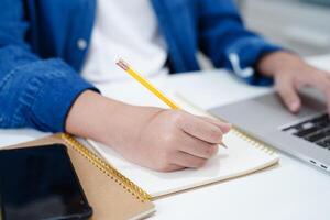 Teenage using smart phone for communication, search data internet website to learn. photo