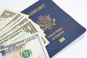 US passport with USA dollar money, American citizen in United States of America. photo