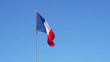 French flag against blue sky. Flag of France video