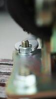 Construction worker tightens a Bolt with a metal Wrench. Close-up of a worker tightening nuts and bolts video