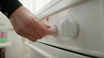 A Woman's Hand Opens And Closes The Kitchen Gas video