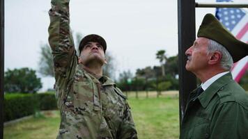 Elderly General Checks The Physical Strength Of The Military Cadet With Pull-ups video