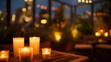 The candles are strategically p around the rooftop creating pockets of light and adding to the intimate setting. video