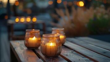 Delicate candle holders and flickering flames add an elegant touch to the rustic rooftop setting. video