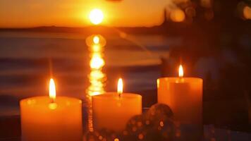 As the sun sets in the distance the warm orange hues of the sky blend with the warm glow of the candles creating a serene and romantic ambiance. video