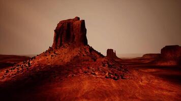 Massive Rock Formation Amid Desert Landscape video