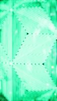 A close up of a green and white abstract design video