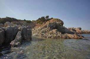 Natural inlet between sea and rock. photo