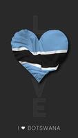 Botswana corazón forma bandera sin costura serpenteado amor vertical estado, 3d representación video