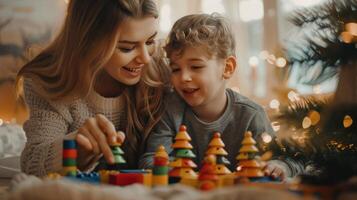 A woman and a child are playing with a pile of colorful blocks photo