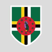 Dominica Flag in Shield Shape Frame vector
